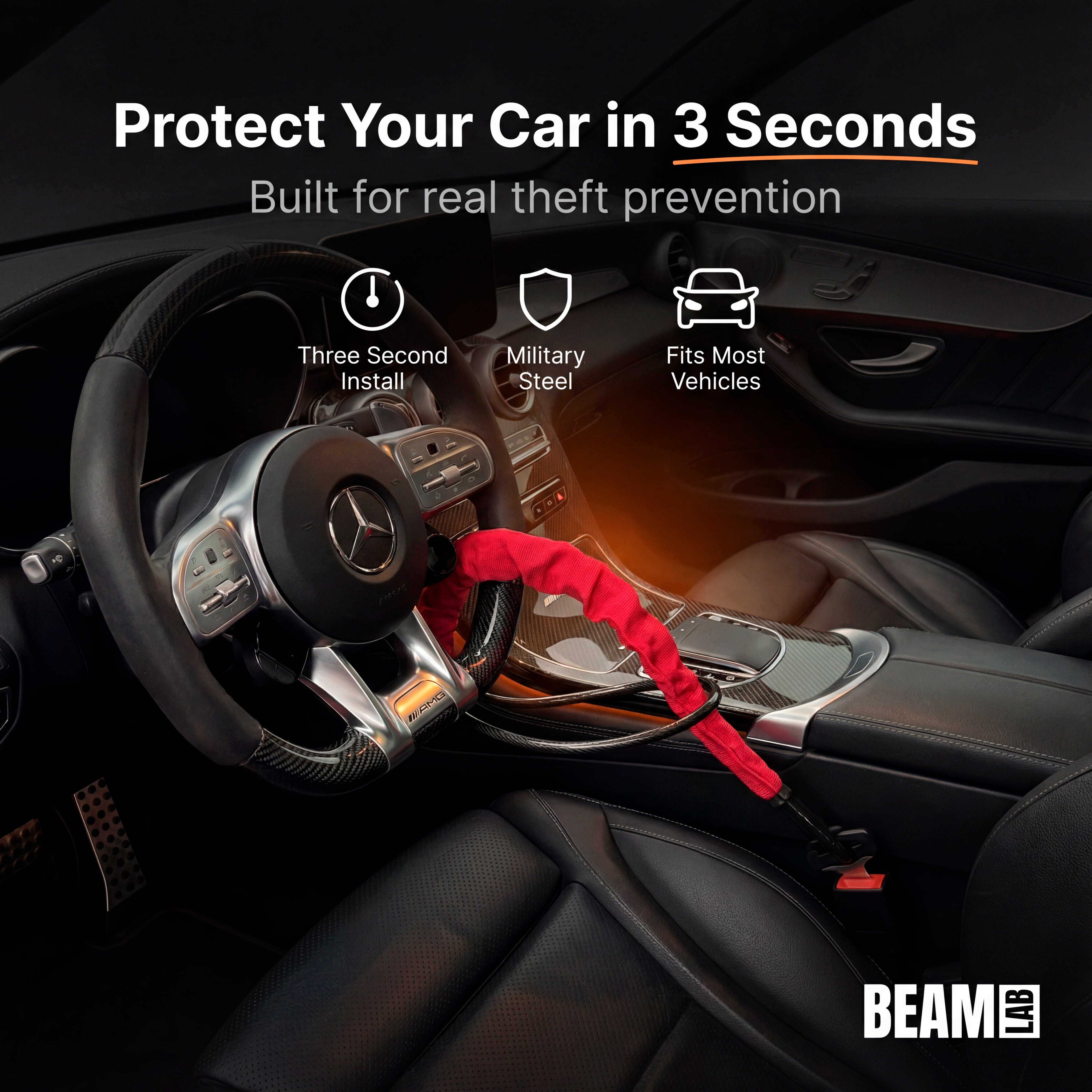 BEAM Lock installed: the cable looped around the steering wheel rim and clicked into the seatbelt buckle